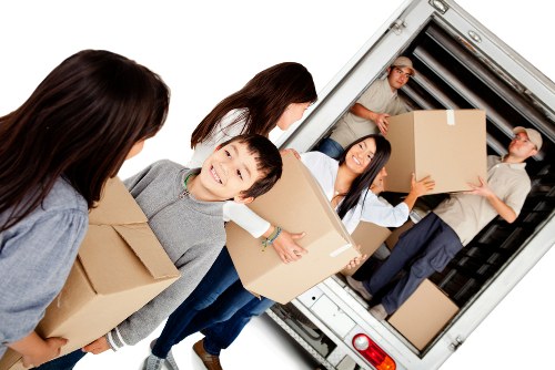 Professional movers handling office relocation in Storage Berrylands