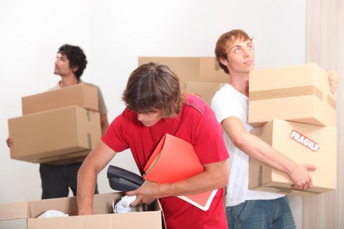 Loading items into a van for storage in Berrylands