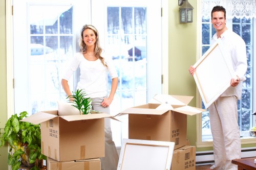 Professional staff assisting with moving truck storage in Berrylands